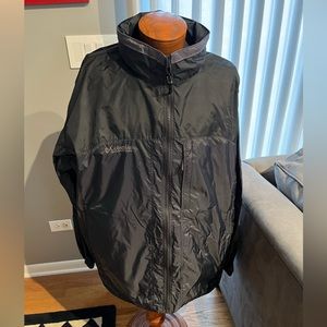 Men’s black packable Columbia windbreaker.   Hidden hood.  Size xxl.